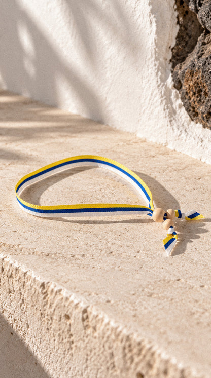 Pulsera de tela con bandera canaria · Ajustable